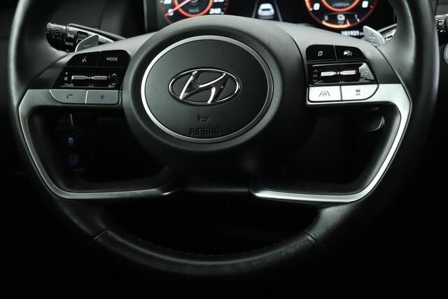 Hyundai TUCSON 1.6 T-GDI HEV Comfort Smart | Trekhaak | Stoel & stuurverwarming | Adaptive cruise | Carplay | Camera | Navigatie | Keyless