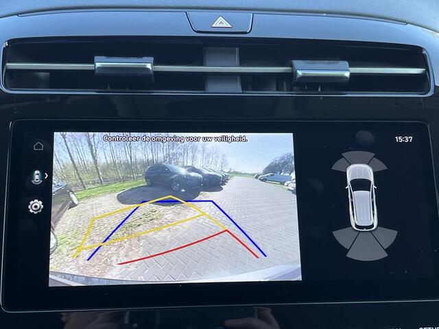 Hyundai TUCSON 1.6 T-GDI HEV 230pk Comfort Smart Automaat / Trekgewicht 1.650 kg / Premium Wielen / Stuur- en stoelverwarming voor / Apple Carplay Android / Elektrische Achterklep / Adaptieve Cruise Control / Krell Soundsystem