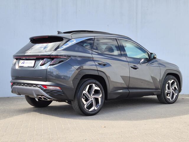 Hyundai TUCSON 1.6 T-GDI 230PK HEV Premium Sky Automaat / 1650kg Trekgewicht / Apple Carplay Android Auto / Adaptief cruise control / Glazen schuif- en kanteldak / Stuur-, en Stoelverwarming / Stoelventilatie /