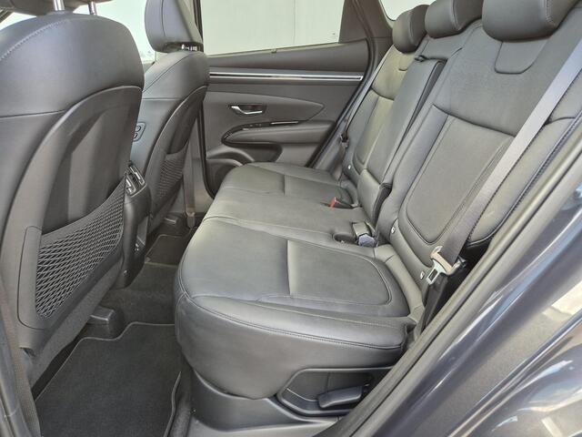 Hyundai TUCSON 1.6 T-GDI 230PK HEV Premium Sky Automaat / 1650kg Trekgewicht / Apple Carplay Android Auto / Adaptief cruise control / Glazen schuif- en kanteldak / Stuur-, en Stoelverwarming / Stoelventilatie /