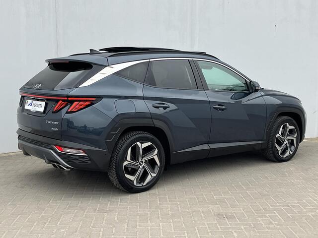 Hyundai TUCSON 1.6 T-GDI PHEV Premium Sky 4WD Automaat / Trekgewicht 1.350 kg / 100% Dealer onderhouden / Elektrisch Glazen schuif- en kanteldak / Elektrische achterklep / Camera 360° / Apple Carplay & Android Auto / Stuur- en stoelverwarming voor en achter / Stoelverko