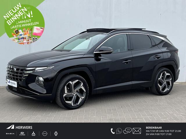 Hyundai TUCSON 1.6 T-GDI PHEV Premium Sky 4WD Automaat / Trekgewicht 1.350 kg / Dealer onderhouden / Elektrisch Glazen schuif- en kanteldak / Elektrische achterklep / Camera 360° / Apple Carplay & Android Auto / Stuur- en stoelverwarming voor en achter / Stoelverkoeling