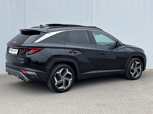 Hyundai TUCSON 1.6 T-GDI PHEV Premium Sky 4WD Automaat / Trekgewicht 1.350 kg / Dealer onderhouden / Elektrisch Glazen schuif- en kanteldak / Elektrische achterklep / Camera 360° / Apple Carplay & Android Auto / Stuur- en stoelverwarming voor en achter / Stoelverkoeling