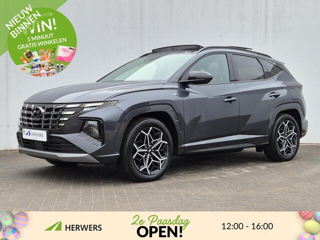 Hyundai TUCSON 1.6 T-GDI PHEV Plug-in N Line Sky 4WD Automaat / HUD / Glazen schuif- en kanteldak / Stuur- en Stoelverwarming / Stoelventilatie voor / Elektrische achterklep / Achterbank verwarming / Rondomzicht camera /