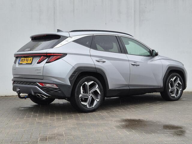 Hyundai TUCSON 1.6 T-GDI HEV 230pk Premium Sky Automaat / Afneembare trekhaak / 1650kg Trekgewicht / Glazen schuif- en kanteldak / Stuur- en Stoelverwarming / Apple Carplay Android Auto / Stoelventilatie voor / Rondomzicht camera /