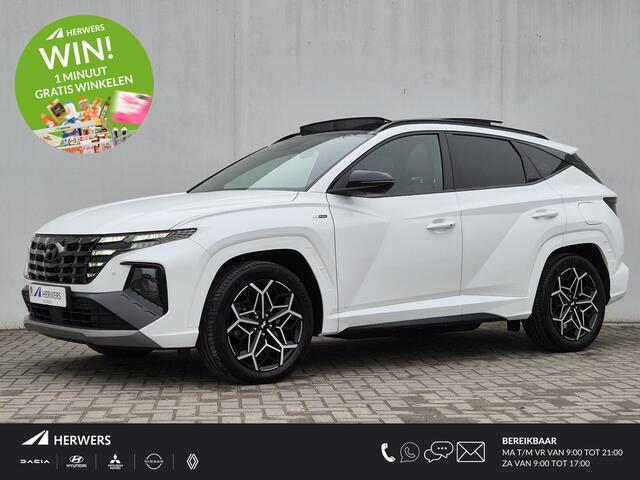 Hyundai TUCSON 1.6 T-GDI PHEV Plug-in N Line Sky 4WD Automaat / Achteruitrijcamera / Apple Carplay Android Auto / Glazen schuif- en kanteldak / Trekgewicht 1350 Kg / Stuur- en Stoelverwarming / Elektrisch bedienbare stoelen - achterklep /