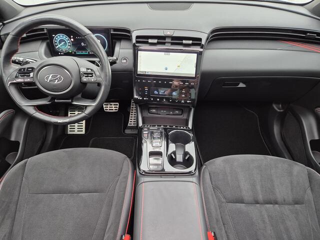 Hyundai TUCSON 1.6 T-GDI PHEV Plug-in N Line Sky 4WD Automaat / Achteruitrijcamera / Apple Carplay Android Auto / Glazen schuif- en kanteldak / Trekgewicht 1350 Kg / Stuur- en Stoelverwarming / Elektrisch bedienbare stoelen - achterklep /