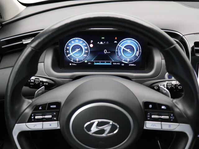 Hyundai TUCSON 1.6 T-GDI HEV Premium Sky AUTOMAAT / GROOT Glazenschuif-kanteldak / 19" LMV / Adaptieve Cruise Control / Historie aanwezig / 1650KG Trekgewicht / Navigatie / Full Option /