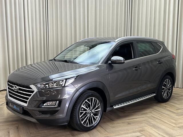 Hyundai TUCSON 1.6 T-GDI *Automaat* Leder / Eerste Eigenaar / Carplay / Cruise / Stoelverwarming / SideSteps / Navigatie / Elek. Stoelen / Camera / 18'' LMV