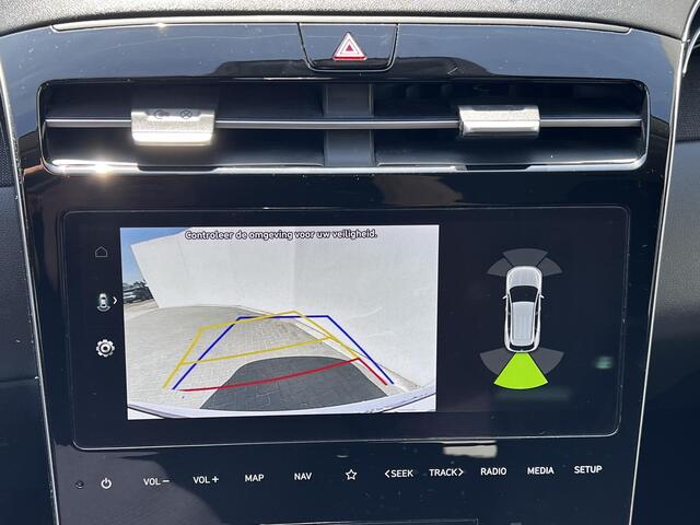 Hyundai TUCSON 1.6 T-GDI HEV 230PK Comfort Automaat / 1.650kg Trekgewicht / Premium wielen / Two Tone /Dealer onderhouden / Navigatie / Apple Carplay Android / Achteruitrijcamera / Winter- en zomerbanden /