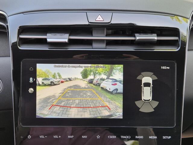 Hyundai TUCSON 1.6 T-GDI HEV 230pk Comfort Smart Automaat / 1650 kg Trekgewicht / Apple Carplay Android Auto / Achteruitrijcamera / Stuur- en Stoelverwarming / Elektrische achterklep / Adaptief cruise control /