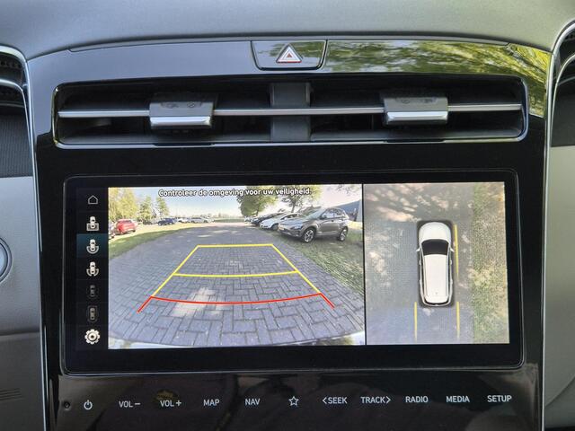 Hyundai TUCSON 1.6 T-GDI HEV 230Pk Premium Sky Automaat / Glazen schuif- en kanteldak / Trekgewicht 1650 Kg / Elektrische achterklep / Adaptief cruise control / Stuur- en Stoelverwarming / Stoelventilatie /