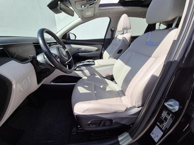 Hyundai TUCSON 1.6 T-GDI HEV 230Pk Premium Sky Automaat / Glazen schuif- en kanteldak / Trekgewicht 1650 Kg / Elektrische achterklep / Adaptief cruise control / Stuur- en Stoelverwarming / Stoelventilatie /