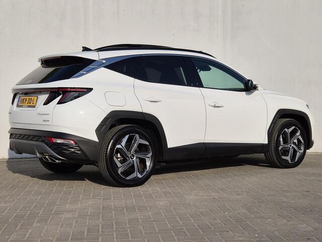 Hyundai TUCSON 1.6 T-GDI PHEV 265pk Premium Sky 4WD Automaat / Accu SoH 100% / Glazen schuif- en kanteldak / Stuur- en Stoelverwarming / Elektrische bedienbare achterklep / Rondomzicht camera / Apple Carplay Android Auto /
