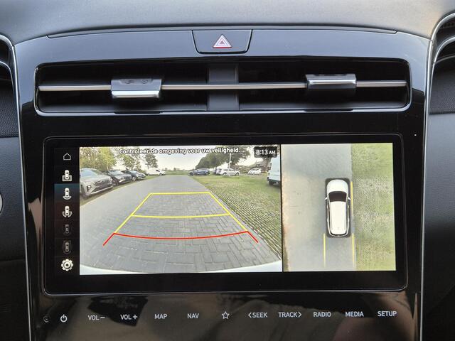 Hyundai TUCSON 1.6 T-GDI PHEV 265pk Premium Sky 4WD Automaat / Accu SoH 100% / Glazen schuif- en kanteldak / Stuur- en Stoelverwarming / Elektrische bedienbare achterklep / Rondomzicht camera / Apple Carplay Android Auto /