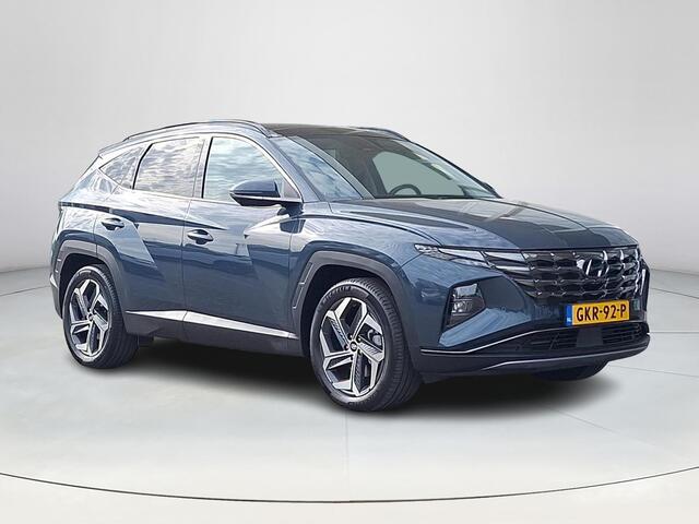 Hyundai TUCSON 1.6 T-GDI HEV Premium Sky | Automaat | Navigatie | Cruise Control Adaptief | Climate Control | Parkeersensoren | Parkeercamera | 36Mnd. Garantie | Rijklaar! |