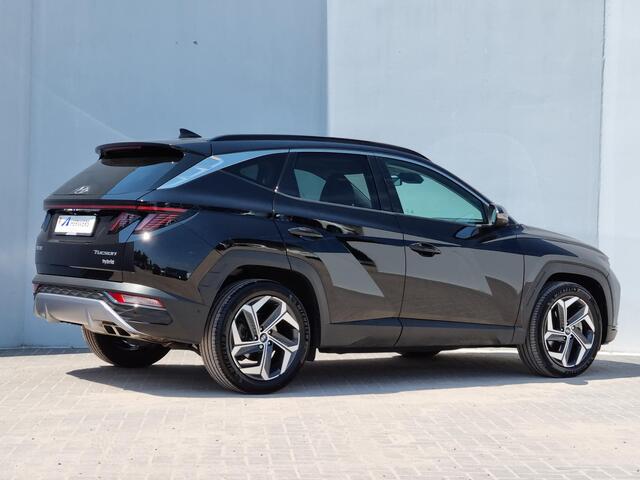 Hyundai TUCSON 1.6 T-GDI HEV Premium Sky 230PK Automaat / Fabrieksgarantie tot 22-01-2026 / Elektrische Achterklep / Elektrisch Schuif-/Kanteldak / Panoramadak / Lederen Bekleding / Achteruitrijcamera Rondomzicht / Navigatie / Android Auto/Apple Carplay / Cruise Con