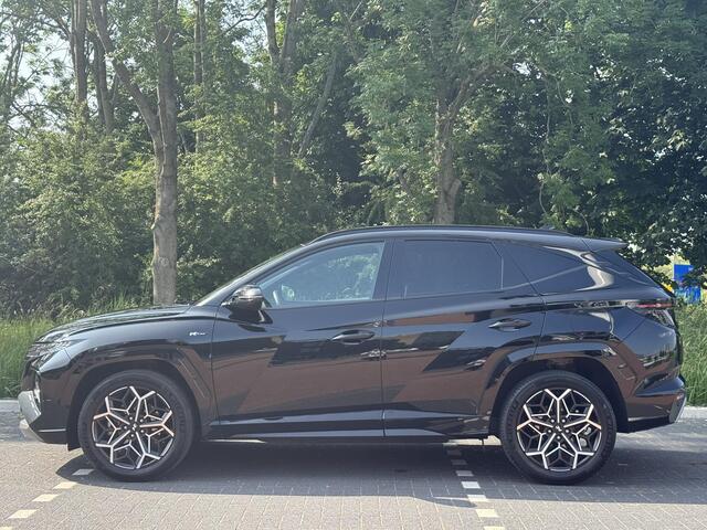 Hyundai TUCSON 1.6 T-GDI 230PK HEV N Line | 1650 kg trekvermogen | Geïntegreerde navigatiesysteem | Stoelverwarming | Android Auto & Apple Carplay | 19'' Lichtmetalen velgen |