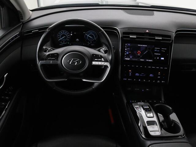 Hyundai TUCSON 1.6 T-GDI HEV Premium | Leder | Stoelventilatie | Adaptive cruise | 360 camera | Carplay | Stuurverwarming | Memory | Navigatie | Full LED