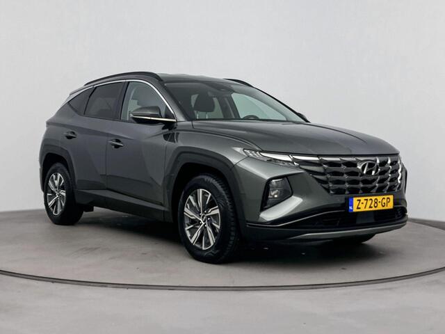 Hyundai TUCSON 1.6 T-GDI HEV Comfort Smart | Trekhaak | Navi | Apple carplay | Cruise control | Stoelverwarming | Camera |