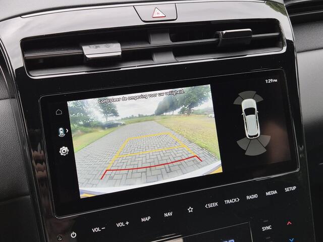 Hyundai TUCSON 1.6 T-GDI PHEV Plug-in N Line 4WD Automaat / Trekhaak afneembaar / Dealer onderhouden / Trekgewicht 1350 Kg / Elektrische achterklep / Stuur- en Stoelverwarming / Adaptief CC / Achteruitrijcamera / Navigatie /