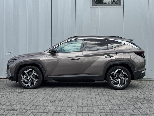 Hyundai TUCSON 1.6 T-GDI PHEV Premium 4WD trekgewicht geremd 1350 KG/ Apple Carplay Android Auto / Climate Control / 360 Camera / Parkeersensoren achter / Adaptie Cruise Control / Led verlichting / Stoelverwarming voor + achter/ Stuurverwarming/ Elektrische Achterkle