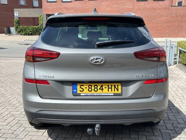 Hyundai TUCSON 1.6 GDi Comfort Navigatie Trekhaak Camera DAB Stoelverwarming Carplay Android Clima + Cruise Control Parkeersensoren Extra Getint Glas All Season Michelin Nette auto !
