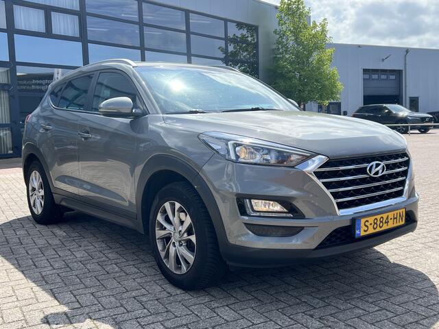 Hyundai TUCSON 1.6 GDi Comfort Navigatie Trekhaak Camera DAB Stoelverwarming Carplay Android Clima + Cruise Control Parkeersensoren Extra Getint Glas All Season Michelin Nette auto !