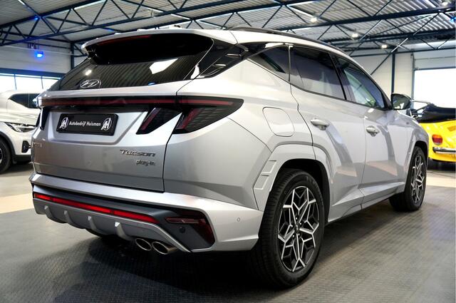 Hyundai TUCSON 1.6 T-GDI PHEV 195kW/265pk Aut6 N Line Sky 4WD PANORAMADAK + ADAPT.CRUISE + LANE ASSIST + KRELL AUDIO + DODEHOEK MELDER + STOELVERWARMING V&A + STUURVERWARMING + STOELVENTILATIE + NAVIGATIE + 360 CAMERA + PARKSENSOREN + 19" LM-VELGEN!!