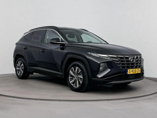 Hyundai TUCSON 1.6 T-GDI HEV Comfort Smart | Trekhaak | All season banden | Navi | Camera | Apple carplay & Android auto| Cruise control | Stoel en stuurverwarming|