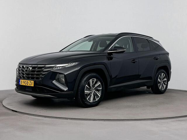 Hyundai TUCSON 1.6 T-GDI HEV Comfort Smart | Trekhaak | All season banden | Navi | Camera | Apple carplay & Android auto| Cruise control | Stoel en stuurverwarming|
