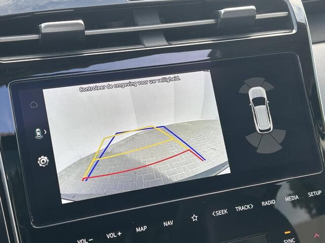 Hyundai TUCSON 1.6 T-GDI PHEV Plug-in Premium Sky 4WD Automaat / Afneembare Trekhaak / Trekgewicht 1350 kg / Apple Carplay Android auto / Stuur-, Stoel en Achterbankverwarming / Glazen schuif- en kanteldak / Elektrische achterklep /