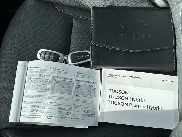 Hyundai TUCSON 1.6 T-GDI PHEV Plug-in Premium Sky 4WD Automaat / Afneembare Trekhaak / Trekgewicht 1350 kg / Apple Carplay Android auto / Stuur-, Stoel en Achterbankverwarming / Glazen schuif- en kanteldak / Elektrische achterklep /
