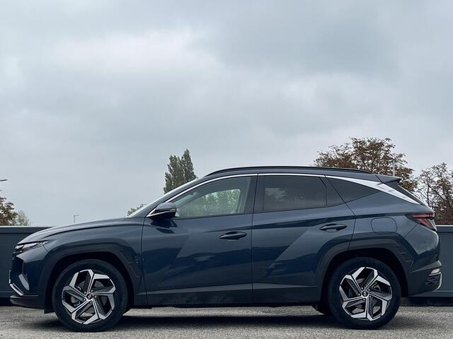 Hyundai TUCSON 1.6 T-GDI HEV Comfort Smart | Adaptieve cruisecontrol | 19'' Lichtmetalen velgen | Elektrische achterklep | Stuurverwarming | Stoelverwarming voor |
