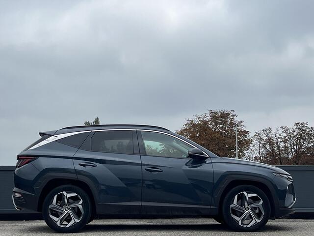 Hyundai TUCSON 1.6 T-GDI HEV Comfort Smart | Adaptieve cruisecontrol | 19'' Lichtmetalen velgen | Elektrische achterklep | Stuurverwarming | Stoelverwarming voor |