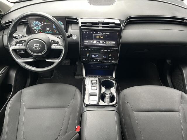 Hyundai TUCSON 1.6 T-GDI HEV Comfort Smart | Adaptieve cruisecontrol | 19'' Lichtmetalen velgen | Elektrische achterklep | Stuurverwarming | Stoelverwarming voor |