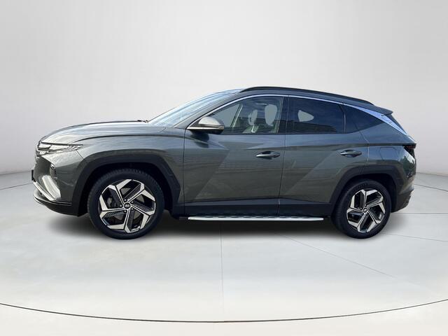 Hyundai TUCSON 1.6 T-GDI HEV Premium Sky | Stoelverwarming/verkoeling | Stuurverwarming | Schuif-kantel dak | Lederen bekleding | 2e zit-rij bankverwarming | 360graden camera | 3-zone klimaatcontrole | Elektrische geheugen stoelen | KRELL- premium audiosysteem |