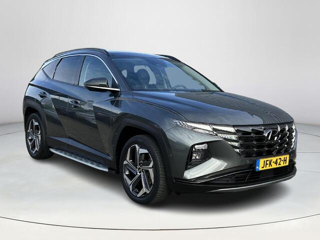 Hyundai TUCSON 1.6 T-GDI HEV Premium Sky | Stoelverwarming/verkoeling | Stuurverwarming | Schuif-kantel dak | Lederen bekleding | 2e zit-rij bankverwarming | 360graden camera | 3-zone klimaatcontrole | Elektrische geheugen stoelen | KRELL- premium audiosysteem |