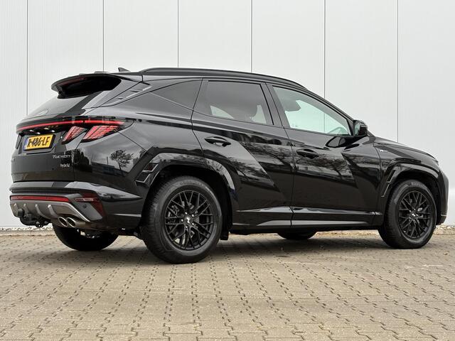 Hyundai TUCSON 1.6 T-GDI HEV N Line Sky / Trekhaak (1650kg) / Elektrisch glazen panorama-dak / Kunstlederen/suede bekleding / Stoelverwarming voor/achter / All-season banden /
