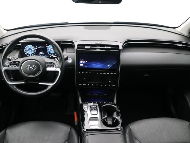 Hyundai TUCSON 1.6 T-GDI HEV Premium / Dealeronderhouden / Afneembare Trekhaak / 1650kg Trekgewicht / Stoel en Stuur Verwarming / 360 Camera / Stoelgeheugen / Verwarmde Achterbank / Navigatie / Lederen bekleding /