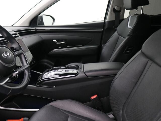 Hyundai TUCSON 1.6 T-GDI HEV Premium / Dealeronderhouden / Afneembare Trekhaak / 1650kg Trekgewicht / Stoel en Stuur Verwarming / 360 Camera / Stoelgeheugen / Verwarmde Achterbank / Navigatie / Lederen bekleding /