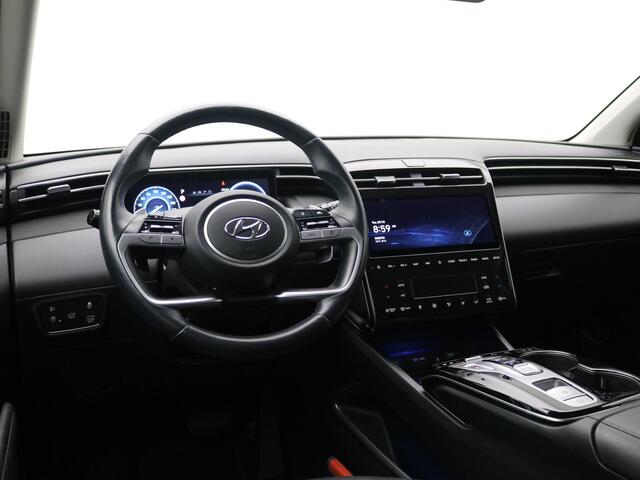 Hyundai TUCSON 1.6 T-GDI HEV Premium / Dealeronderhouden / Afneembare Trekhaak / 1650kg Trekgewicht / Stoel en Stuur Verwarming / 360 Camera / Stoelgeheugen / Verwarmde Achterbank / Navigatie / Lederen bekleding /