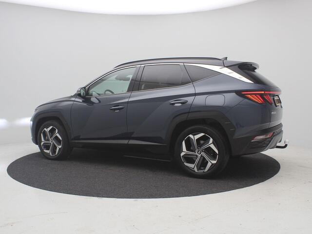 Hyundai TUCSON 1.6 T-GDI HEV Premium / Dealeronderhouden / Afneembare Trekhaak / 1650kg Trekgewicht / Stoel en Stuur Verwarming / 360 Camera / Stoelgeheugen / Verwarmde Achterbank / Navigatie / Lederen bekleding /