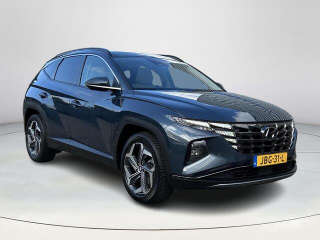 Hyundai TUCSON 1.6 T-GDI HEV Premium Sky | Stoelverwarming/verkoeling | Stuurverwarming | Schuif-kantel dak | Lederen bekleding | 2e zit-rij bankverwarming | 360graden camera | 3-zone klimaatcontrole | Elektrische geheugen stoelen | KRELL- premium audiosysteem |