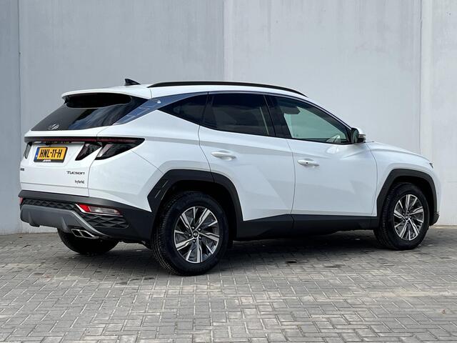 Hyundai TUCSON 1.6 T-GDI HEV 230 PK Premium Automaat / Trekgewicht 1650 kg / Apple Carplay Android Auto / Stuur- en Stoelverwarming / Rondomzicht camera / Climate Control / Stoelventilatie voor /