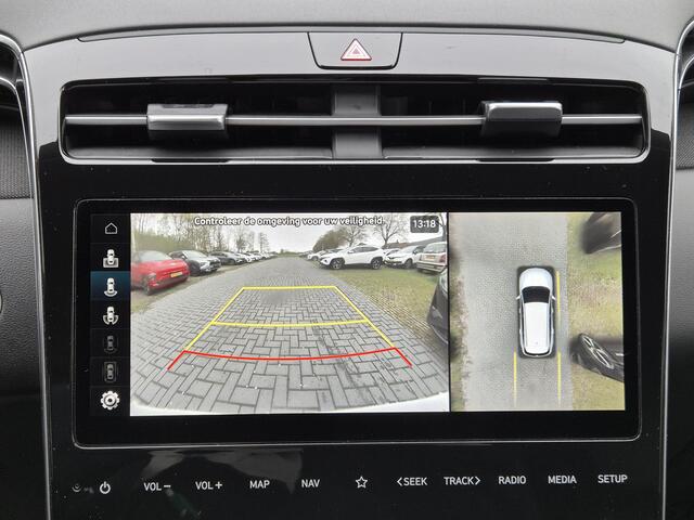 Hyundai TUCSON 1.6 T-GDI HEV 230 PK Premium Automaat / Trekgewicht 1650 kg / Apple Carplay Android Auto / Stuur- en Stoelverwarming / Rondomzicht camera / Climate Control / Stoelventilatie voor /