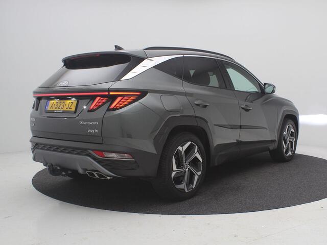 Hyundai TUCSON 1.6 T-GDI PHEV Premium 4WD AUTOMAAT /Trekhaak / 1ste Eigenaar / NL auto / Dealer onderhouden / Navigatie / Lederen bekleding / Stoelverwarming Voor & Achter / Adaptieve Cruise Control /