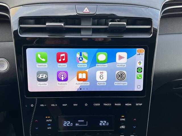 Hyundai TUCSON 1.6 T-GDI HEV 230pk Comfort Smart / Fabrieksgarantie tot 09-2028 / Dealer onderhouden / Trekgewicht 1650 KG / Navigatie / Achteruitrijcamera / Stuur- en stoelverwarming / Apple Carplay/Android auto / 19" LM /