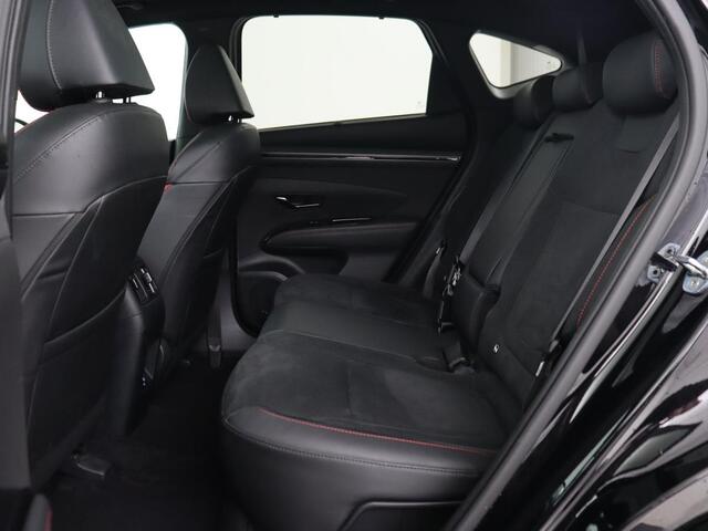 Hyundai TUCSON 1.6 T-GDI PHEV N Line Sky 4WD | Panoramadak | Leder/Alcantara | Stoelverwarming | Camera | Carplay | Stuurverwarming | Keyless | Full LED | Navigatie | 19'' lichtmetalen velgen | Plug In