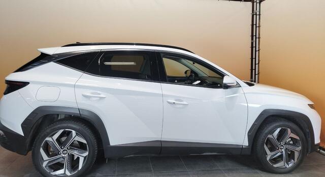 Hyundai TUCSON 1.6 T-GDI PHEV Premium Sky 4WD schuifdak | stoelverw | stoelvent semi leer | cruise
